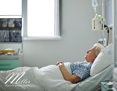 woman lying in hospital bed